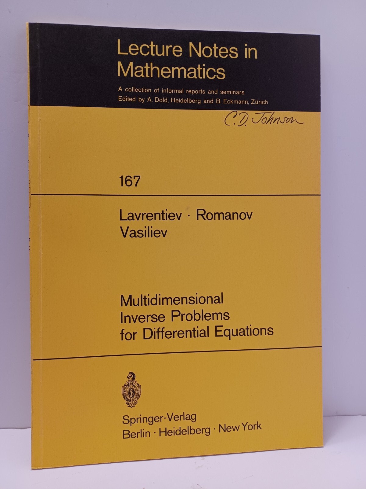 Multidimensional Inverse Problems for Differential Equations – Lavrentiev